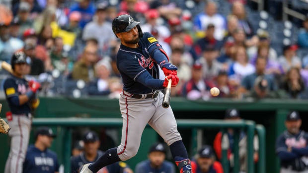 Sep 24, 2023; Washington, District of Columbia, USA; Atlanta Braves left fielder Kevin Pillar (17) hits a single during the seventh inning against the Washington Nationals at Nationals Park.